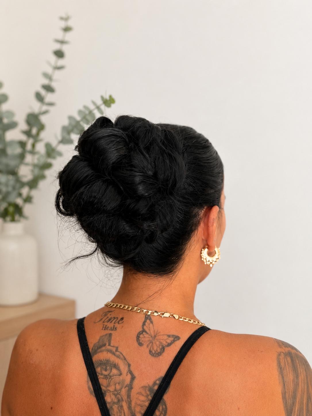 Sleek braided low bun